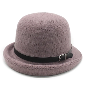 Elegant knit cloche hat in mauve with a black faux leather band and silver buckle
