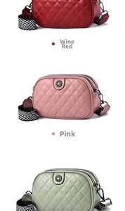 Detail of quilted crossbody camera bags in burgundy, pink, and green with wide straps