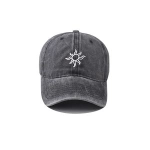 Distressed grey washed cotton baseball cap with white sunburst embroidery on the front