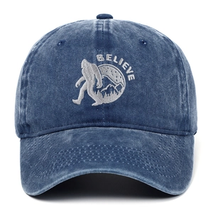 Vintage navy blue washed denim baseball cap featuring silver BELIEVE embroidery