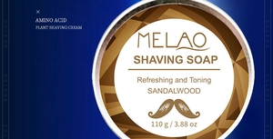 Macro shot of 110g Sandalwood Shaving Soap packaging featuring Amino Acid ingredients