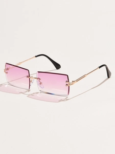 Detail of rimless rectangle sunglasses with purple gradient lenses and gold metal frames
