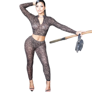 Women's slim fit two-piece set with mesh crop top and pants in brown grid print