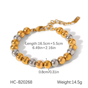 Détail du bracelet à billes bicolore en acier inoxydable doré et argenté avec dimensions