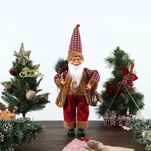 Standing Santa Claus doll with red plaid hat and lantern for festive window decoration