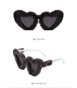 Detailed front and 45-degree side view of heart-shaped sunglasses with black faux fur trim