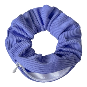Detailed view of purple tie-dye velvet hair scrunchie featuring hidden zipper pocket