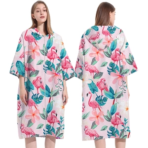 Hooded microfiber beach poncho with flamingo and tropical floral print, front and back view