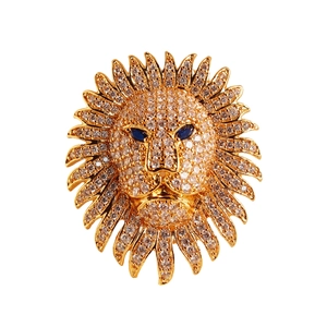 Golden lion head ring with sparkling crystals and vibrant blue gemstone eyes