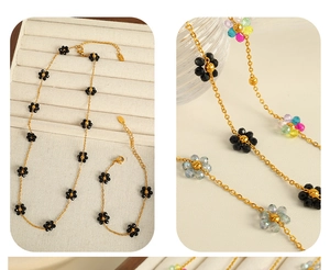 Macro shot of colorful crystal flower necklace and bracelet set on a jewelry display box