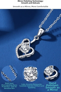Detail view of heart-shaped silver necklace with moissanite and multilayer plating