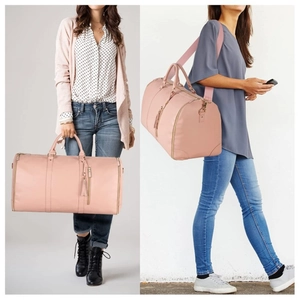 Pink large capacity travel tote bag with gold hardware and tassel zipper details