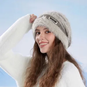Women's winter warm knit beanie with faux fur trim and sparkling silver sequins decor
