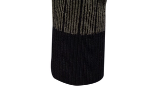 Detail of high-density ribbed cuff with green stripes on black knitted sweater fabric