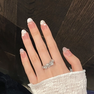 Elegant silver flower ring with sparkling crystals and floral nail art decoration