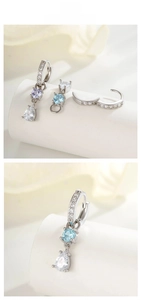 Détail des boucles d'oreilles créoles en argent S925 avec pendentifs en zircon colorés