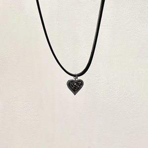 Gothic leather choker with a black zircon heart pendant and silver metallic frame