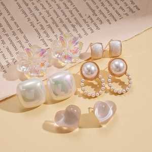 Ten-piece resin pearl heart and flower earring set with elegant geometric studs