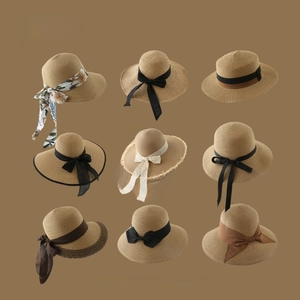 Collage of wide brim straw sun hats with various decorative ribbons and lace details