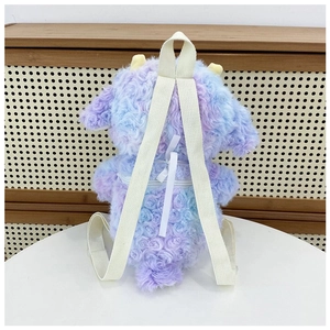 Rear view of fuzzy purple-blue gradient plush backpack with white shoulder straps