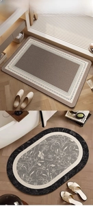 Detail view of rectangular and oval bath mats with Nordic floral and geometric designs