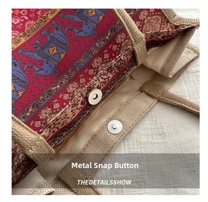 Detail view of ethnic pattern tote bag featuring a secure silver magnetic metal buckle