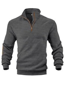 Nahaufnahme des dunkelgrauen Herren-Sweatshirts aus Waffelstrick mit Viertelreißverschluss