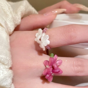 Handmade beaded flower ring set in white and pink shell petals for elegant women fashion