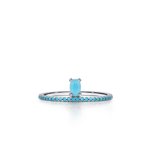 S925 sterling silver ring with oval turquoise stone and matching pavé setting on white background