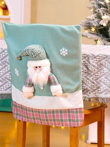 Detail of Christmas chair cover with 3D Santa Claus doll and festive bell decorations