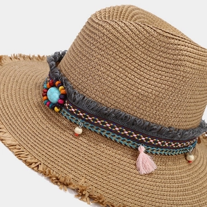 Straw Panama hat with bohemian colorful beaded band and turquoise stone detail