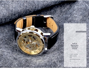 Macro detail of skeleton mechanical watch face with Roman numerals and leather strap