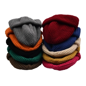 Set of 10 colorful ribbed knit beanies for men and women in various winter fashion shades