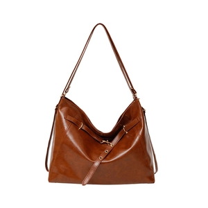 Retro dark brown oily leather tote bag for women with glossy finish and metal buckle