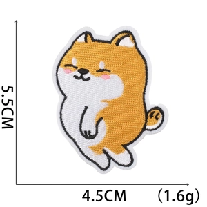 Detail view of cartoon Shiba Inu embroidery patch showing 5.5cm x 4.5cm dimensions