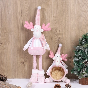Pink and white reindeer plush figures with knitted hats for Christmas home decor