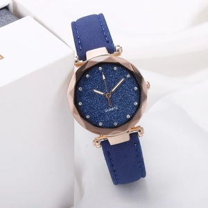 Detailed macro view of a starry sky dial watch with rose gold case and leather strap
