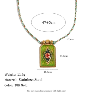 18K gold plated stainless steel rectangle pendant with sun eye motif on woven cord