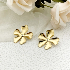 Gold plated stainless steel floral stud earrings with sparkling center crystal