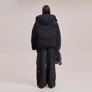 Back view of a black hooded down jacket and matching multi-pocket cargo pants