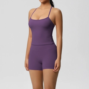 Front view of purple yoga set with thin strap tank top and high waist sports shorts