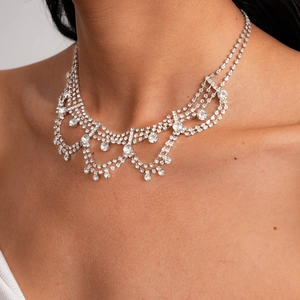 Detailed view of luxury silver layered necklace with teardrop sparkling rhinestones