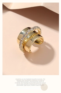 Detailed view of gold multi-layered ear cuff with sparkling zircon micro-insets