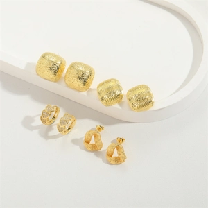 Exaggerated golden heart pendant earrings and geometric alloy jewelry collection