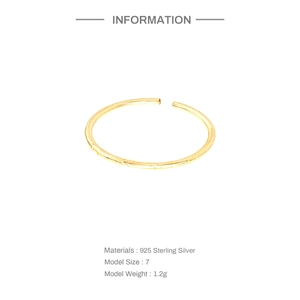 Detail view of gold S925 sterling silver triple layer cross ring showing weight and size