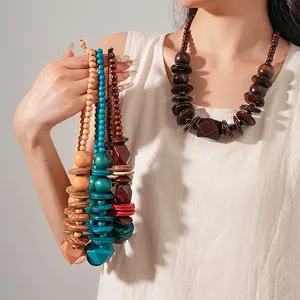 Ethnic style wood bead necklace with coconut shell faceted pendants and retro design