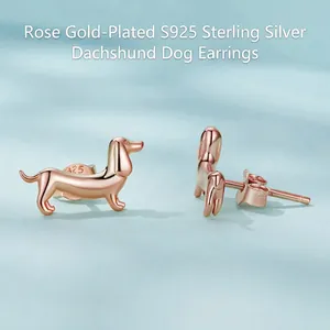 Polished S925 sterling silver dachshund puppy stud earrings in rose gold finish