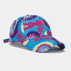 Detail of multi-color tie-dye baseball cap with adjustable strap and curved brim style