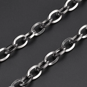 Macro shot of 9mm stainless steel hip hop chain links with polished silver-grey finish