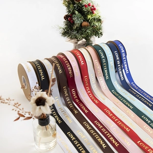 Multi-color 2.5cm ribbed ribbons with gold LOVE IS ETERNAL lettering for gift wrapping